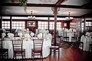 Holidays & Catering 13 Woodsgate dining hall with white table settings