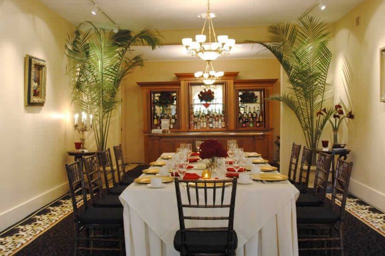 Holidays & Catering 7 The Stroudsmoor Inn Auradell private dining room boasts a long family table with white table cloth and plate settings