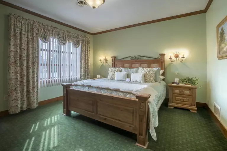 What is a Boutique Poconos Resort? 3 Beautiful room with bed