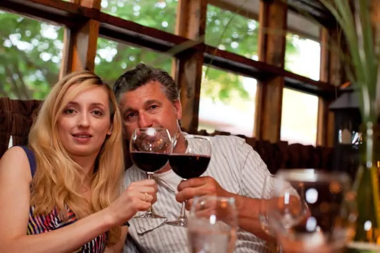 Poconos Resort Getaway: Planning your next romantic vacation 7 Couple enjoying wine - making toast