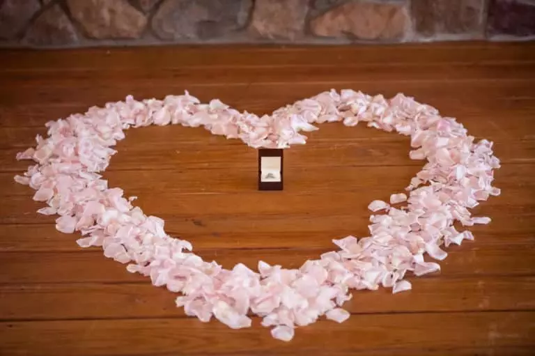 Poconos Resort Getaway: Planning your next romantic vacation 8 Rose petal heart with engagement ring