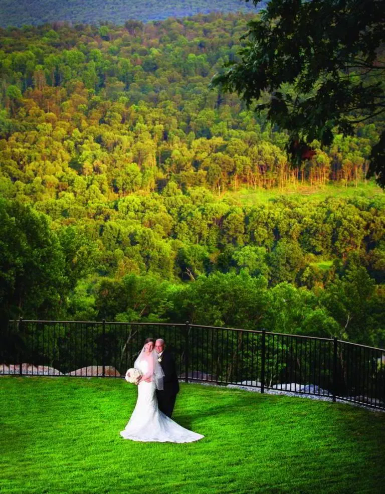 What is a Boutique Poconos Resort? 12 Breathtaking view at Stroudsmoor - Terraview - Wedding Couple